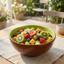 Product Ceramic serving bowl, Kiwi design. Ideal for stylish dining tables and buffets. 15cm