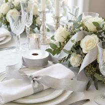 Product Luxurious silver silk ribbon with elegant feather design – Ideal for weddings and festive occasions Width 25mm Length 15m