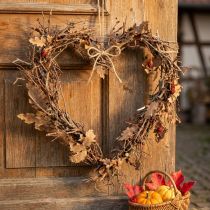 Product Country-style decorative heart-shaped door wreath made of branches with oak leaves, natural wall decoration Ø28cm