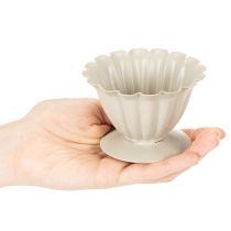 Product **Cream Decorative Bowl with Flower Petal Design, 9cm**

```html
<h2>Cream Decorative Bowl for Home and Seasonal Styling</h2>

<p>This cream decorative bowl, shaped like an open flower, adds subtle elegance to your home décor. With a height of 9cm, it off