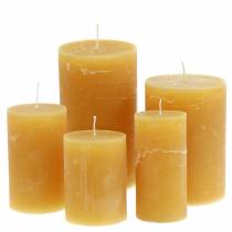 Product Solid coloured candles Honey colours Various sizes