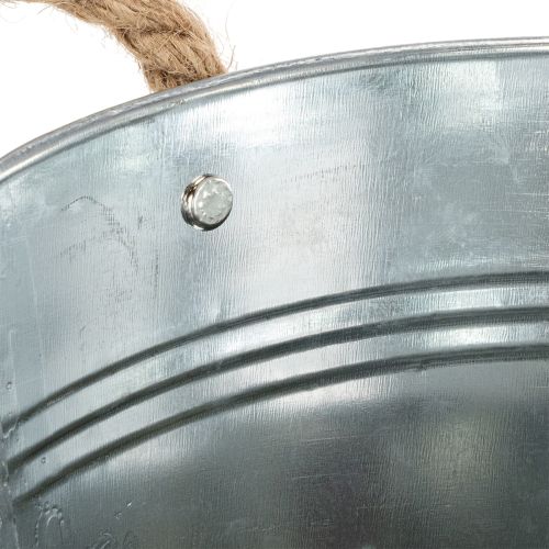 Glossy metal bucket with rope