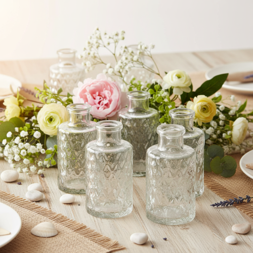 ProductName  
Set of 6 Mini Glass Vases with Diamond Pattern – Clear 9cm  

/ProductName  

ProductDescription  
<h2>Clear Mini Glass Vases for Home and Table Decoration</h2>  
<p>These mini glass vases with a diamond-patterned surface provide a stylish a | Floristik24.co.uk