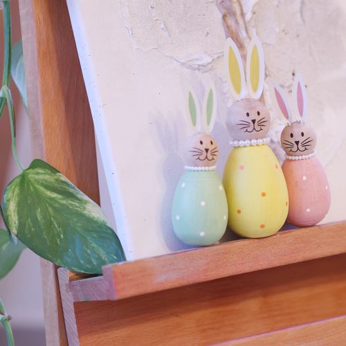 Product Decorative rabbit figurines in an egg design for spring-like home decor, 12cm, 3 pieces