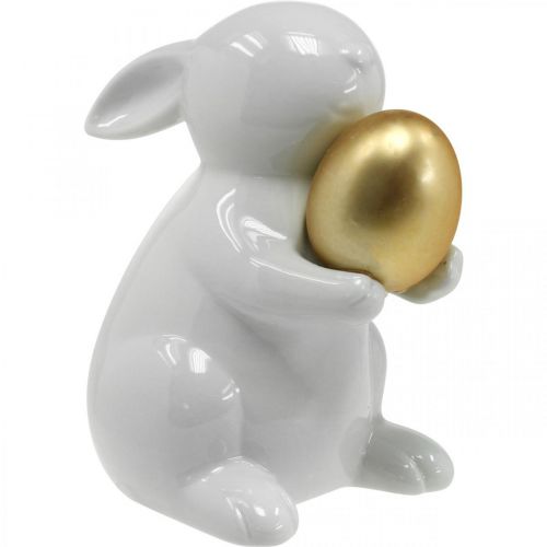 Floristik24 Rabbit with golden egg ceramic, Easter decoration elegant white, golden H15cm