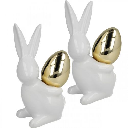 Floristik24 Rabbits with gold egg, ceramic rabbits for Easter noble white, golden H13cm 2pcs