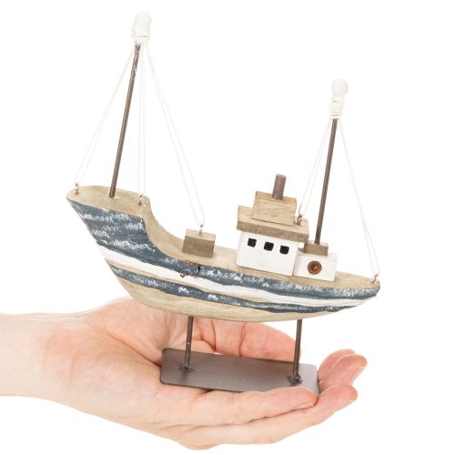 ProductName  
Wooden Decorative Ship with Stand – 20cm  

ProductDescription  
```html
<h2>Maritime Wooden Decorative Ship with Stand for Nautical Home Styling</h2>  

<p>Bring a touch of the seaside into your home with this charming wooden decorative shi | Floristik24.co.uk