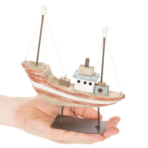 ProductName  
Decorative Wooden Boat Model for Windowsill 20cm  

ProductDescription  
<div>  
<h2>Charming Wooden Boat Model for Decorative Accents</h2>  
<p>This delightful wooden boat model is a versatile decorative piece perfect for adding a nautical  | Floristik24.co.uk