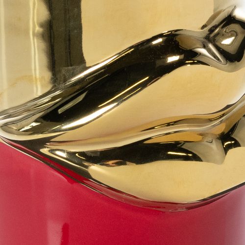 Decorative vase with lipstick
