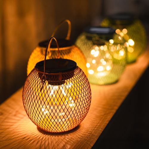 Product Round LED solar lantern, perfect for garden or patio, atmospheric lighting, 12cm