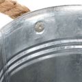 Glossy metal bucket with rope