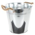 Glossy metal bucket with rope