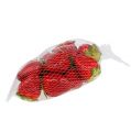 Floristik24 Strawberry red 5cm in a net 12pcs
