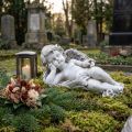 Angel lying grave decoration