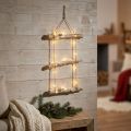 Christmas wall decoration with micro LED fairy lights, small wooden snowflakes and snow-covered branches H150cm | Floristik24.co.uk