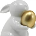 Floristik24 Rabbit with golden egg ceramic, Easter decoration elegant white, golden H15cm